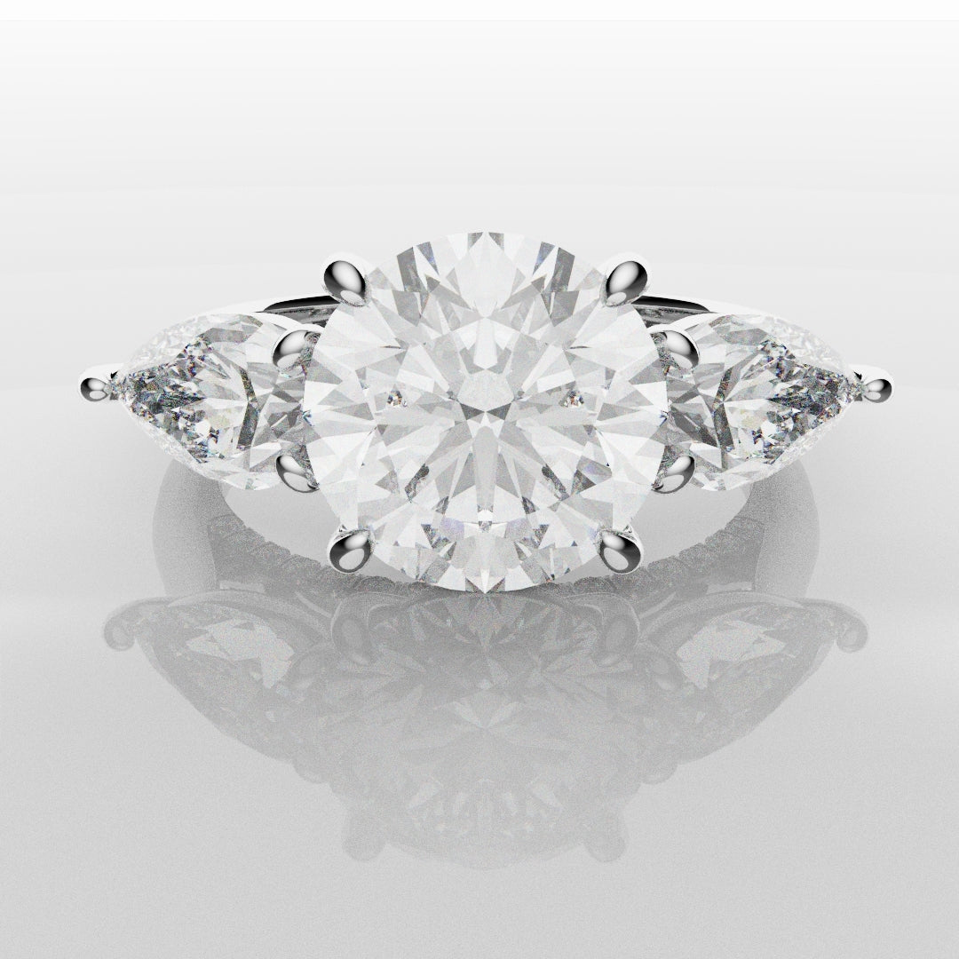 Round and Pear Trilogy Engagement Ring with Diamond Set Cathedral