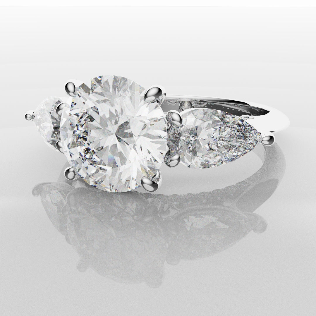 Round and Pear Trilogy Engagement Ring with Diamond Set Cathedral