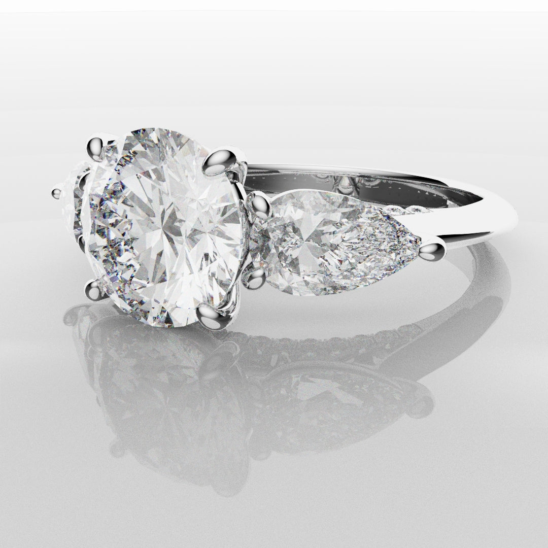 Round and Pear Trilogy Engagement Ring with Diamond Set Cathedral