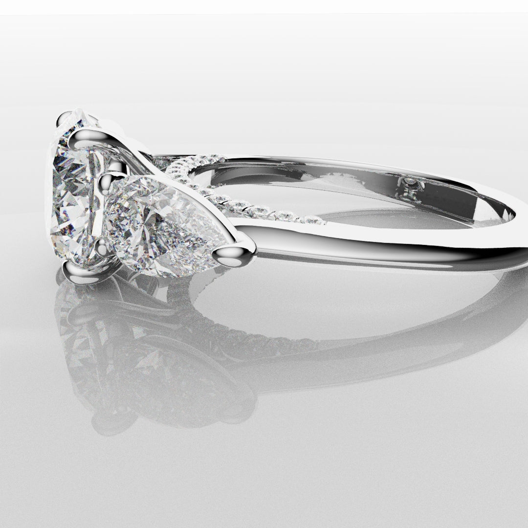 Round and Pear Trilogy Engagement Ring with Diamond Set Cathedral