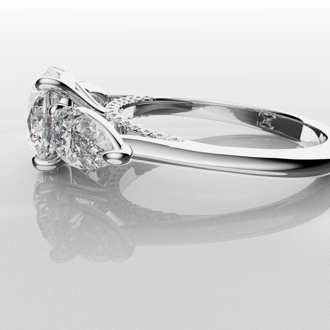 Round and Pear Trilogy Engagement Ring with Diamond Set Cathedral