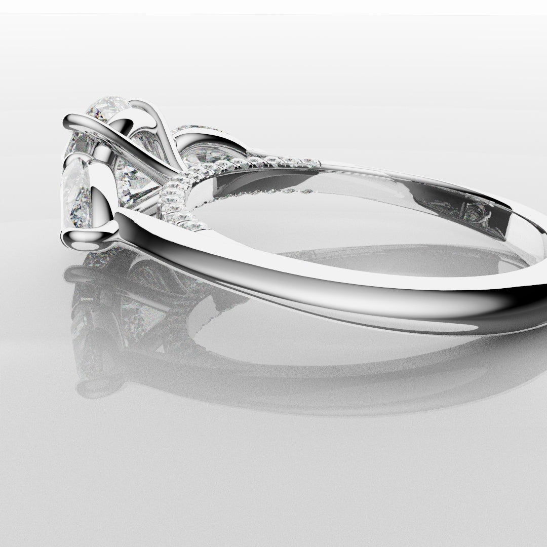 Round and Pear Trilogy Engagement Ring with Diamond Set Cathedral