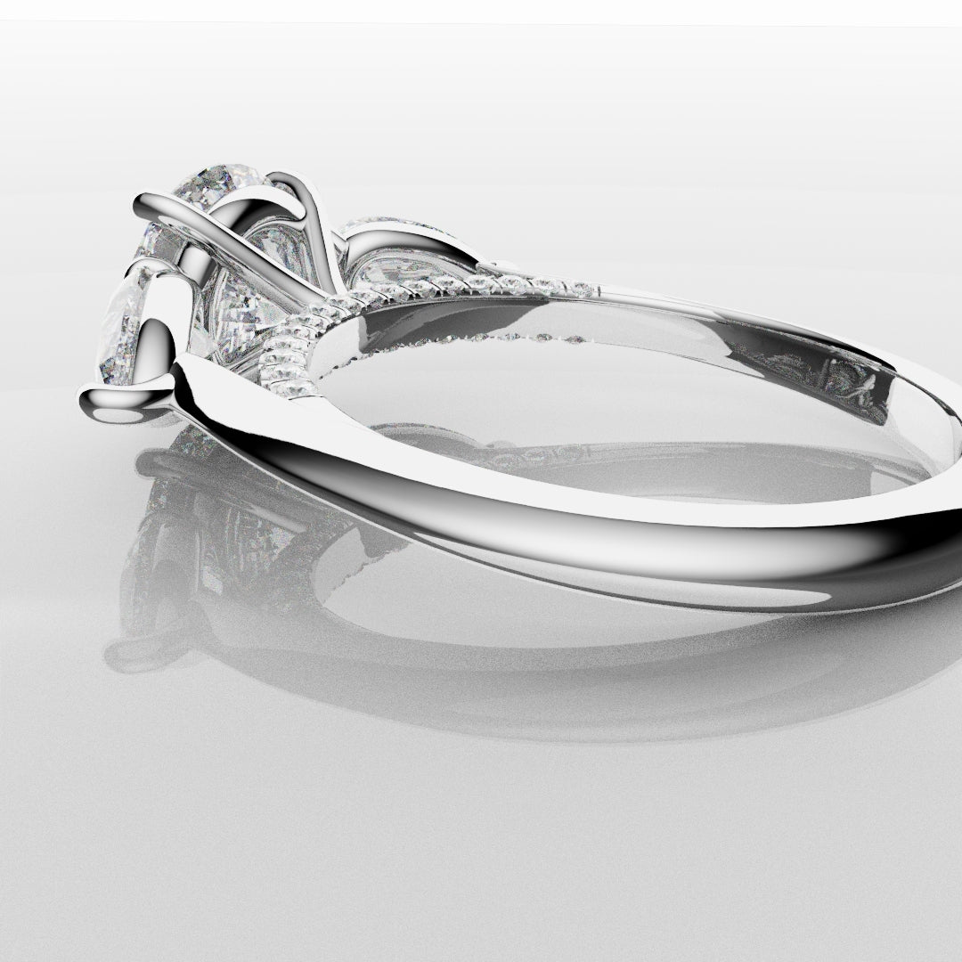 Round and Pear Trilogy Engagement Ring with Diamond Set Cathedral