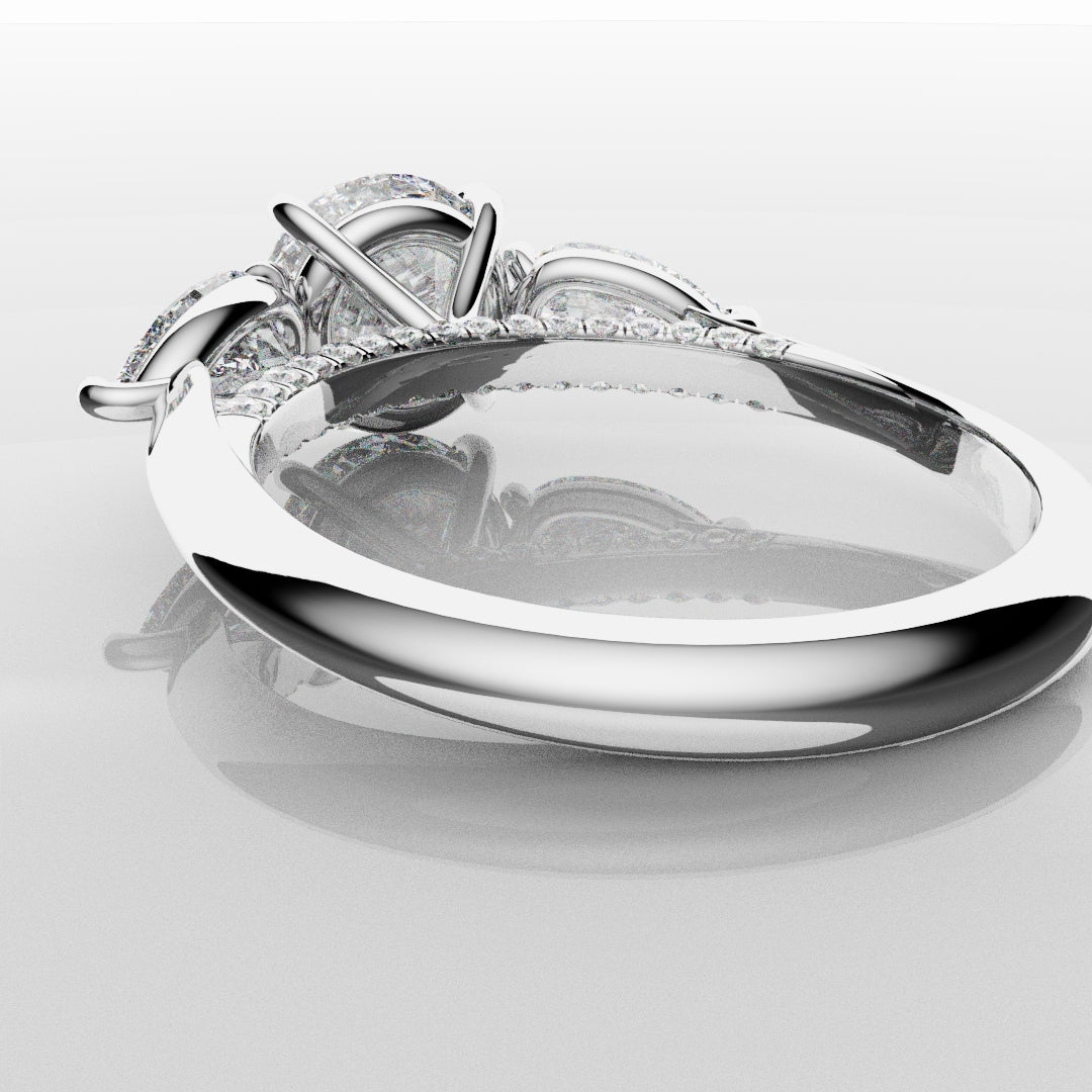 Round and Pear Trilogy Engagement Ring with Diamond Set Cathedral