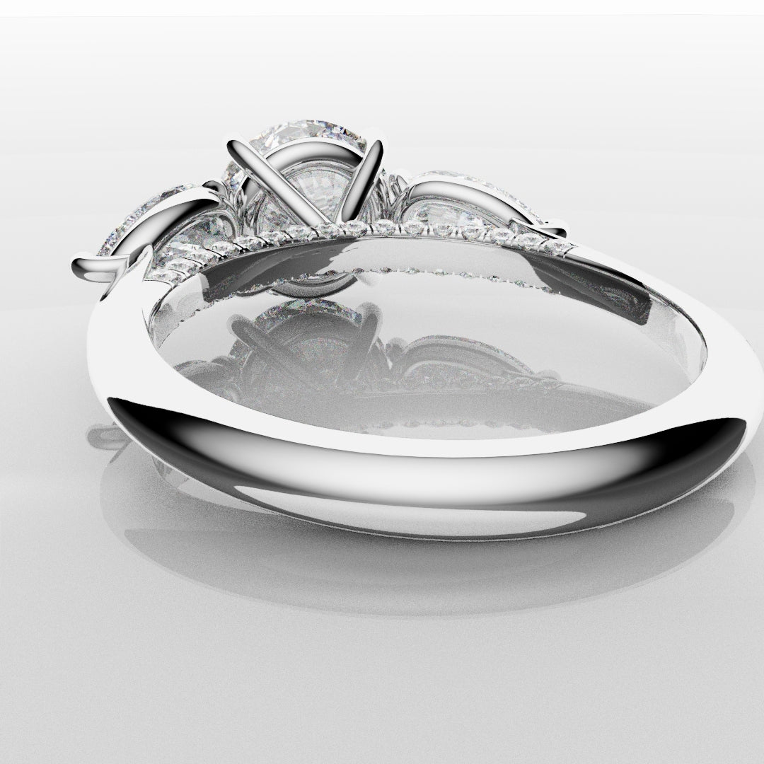 Round and Pear Trilogy Engagement Ring with Diamond Set Cathedral