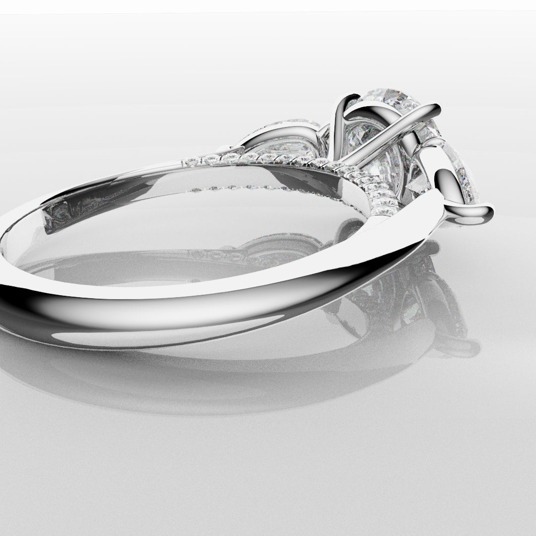 Round and Pear Trilogy Engagement Ring with Diamond Set Cathedral