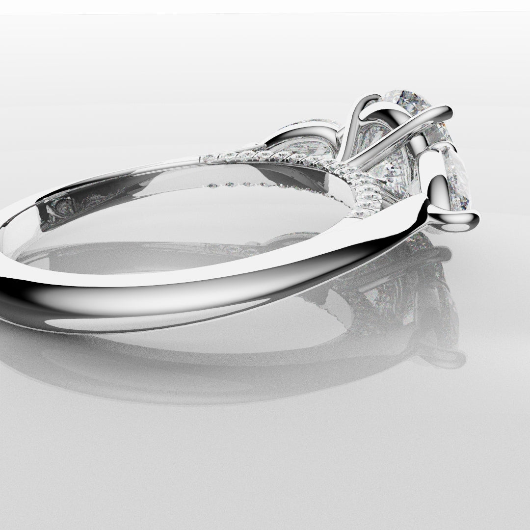 Round and Pear Trilogy Engagement Ring with Diamond Set Cathedral