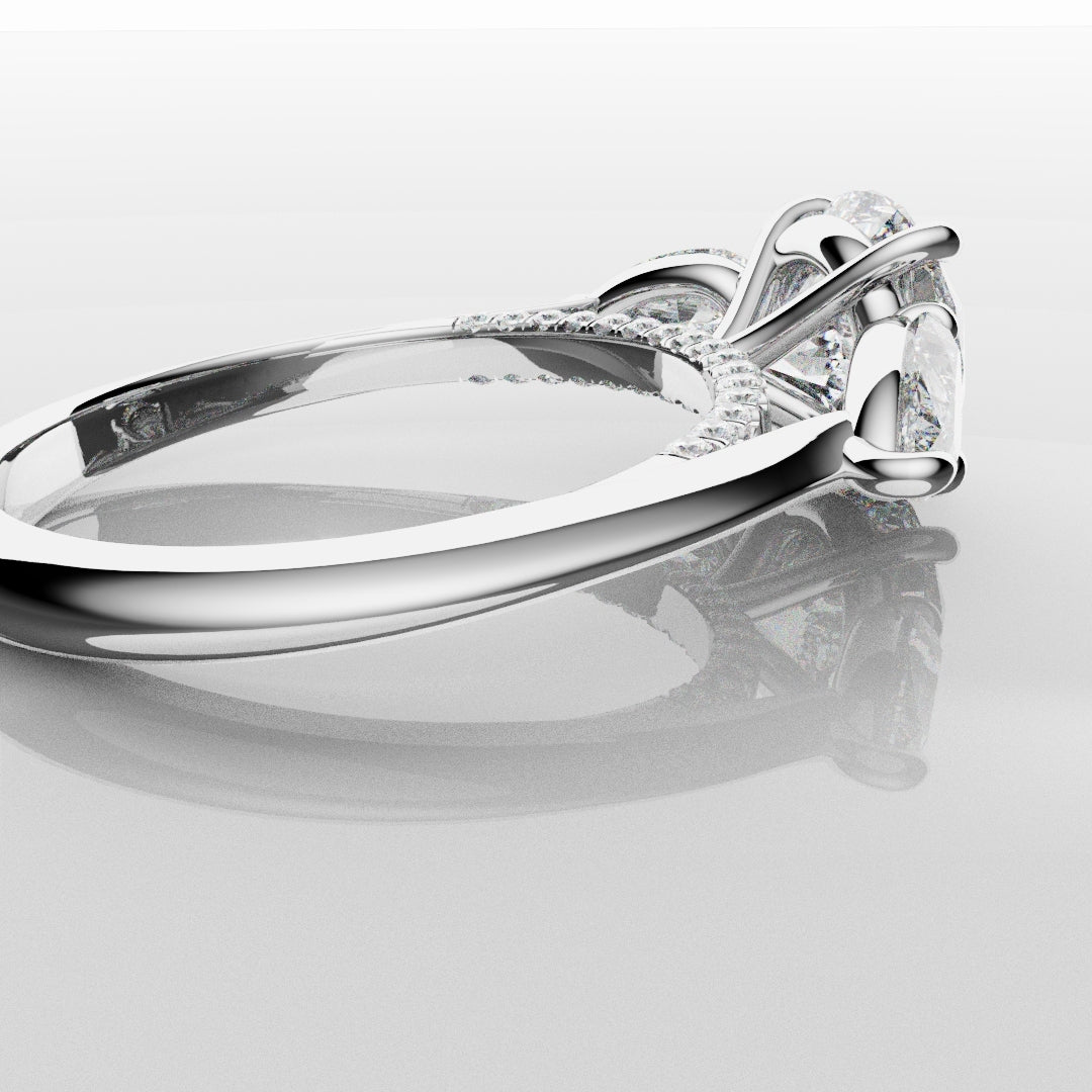 Round and Pear Trilogy Engagement Ring with Diamond Set Cathedral