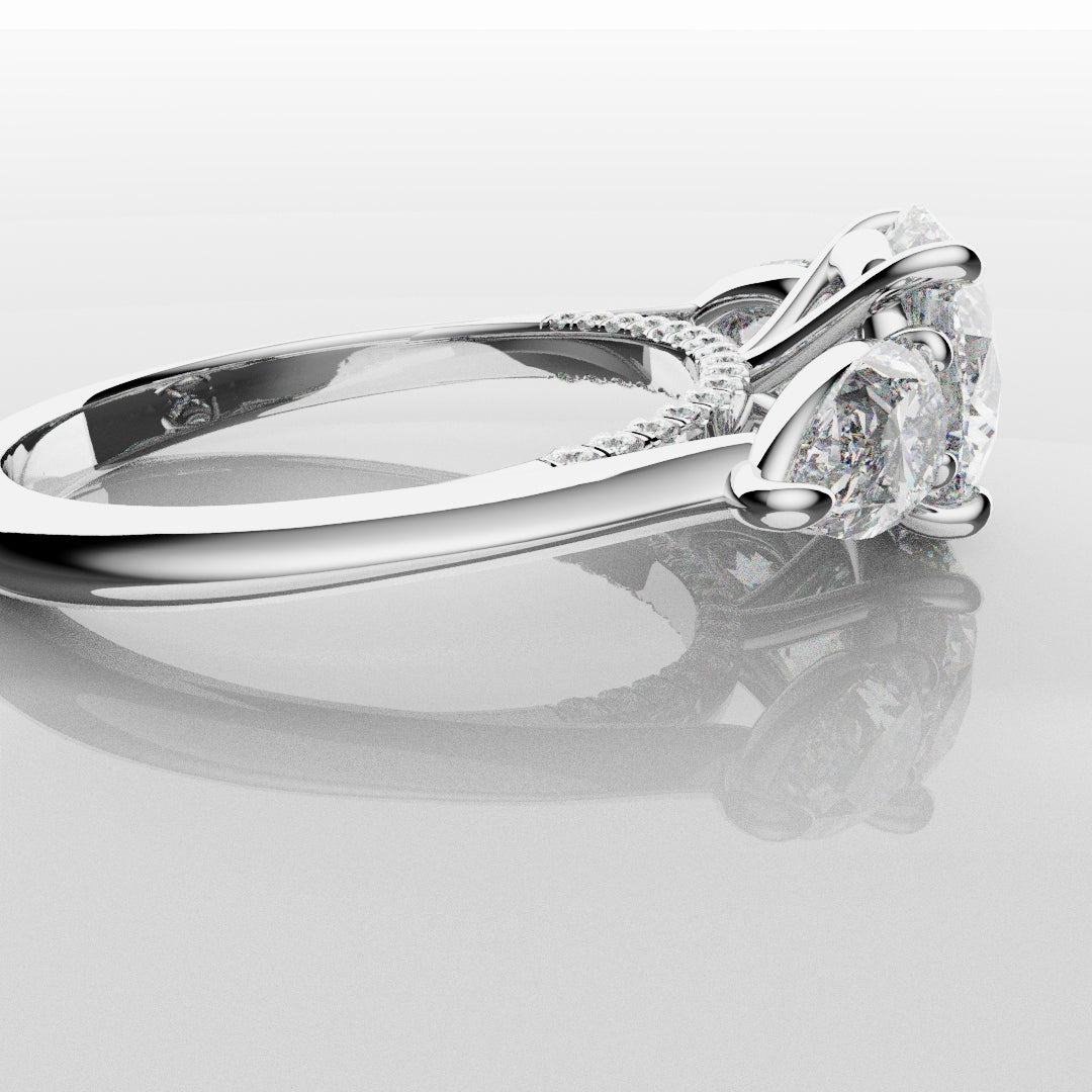 Round and Pear Trilogy Engagement Ring with Diamond Set Cathedral