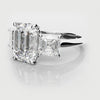 emerald and asscher cut diamond three stone engagement ring