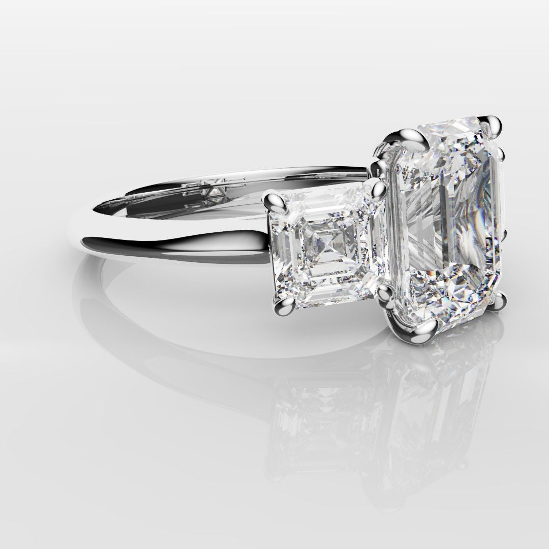 Emerald and Asscher Cut Diamond Trilogy Engagement Ring