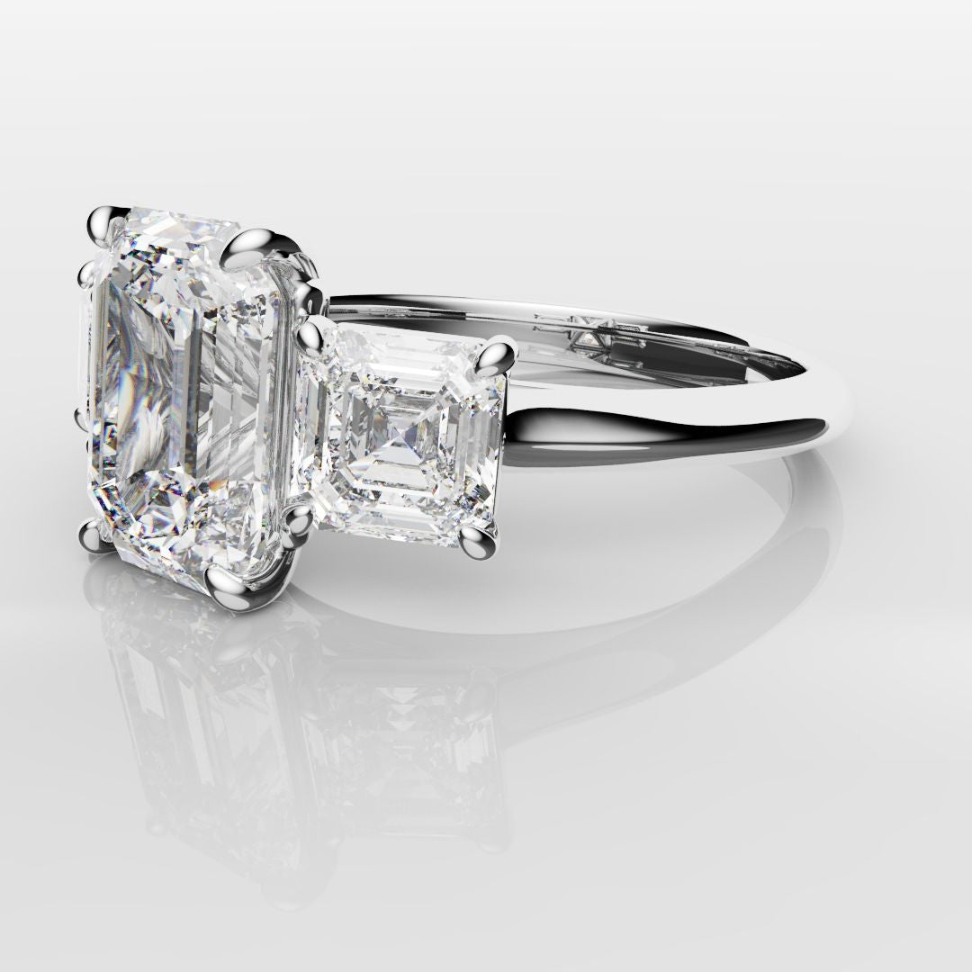 Emerald and Asscher Cut Diamond Trilogy Engagement Ring