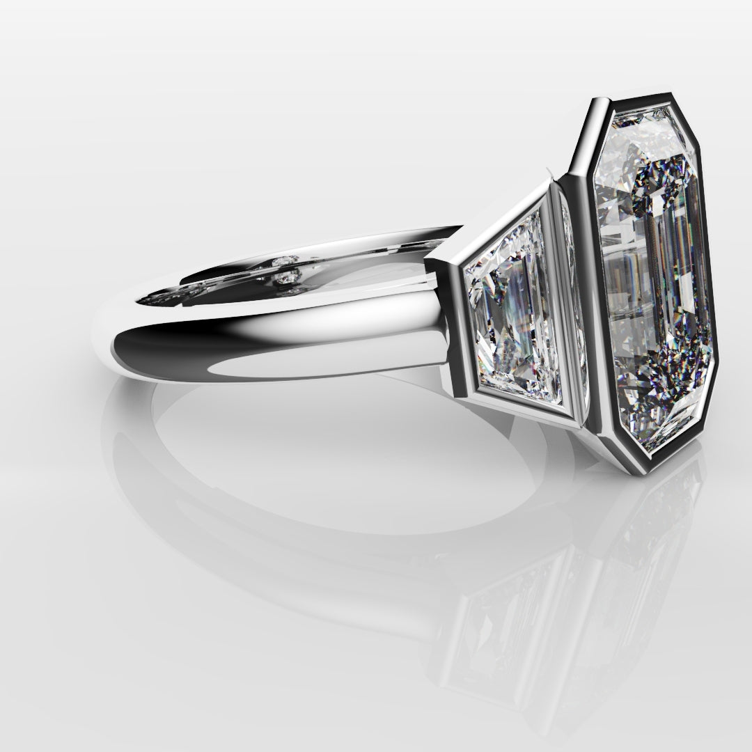 Emerald Cut and Trapezoid Diamond Trilogy Engagement Ring