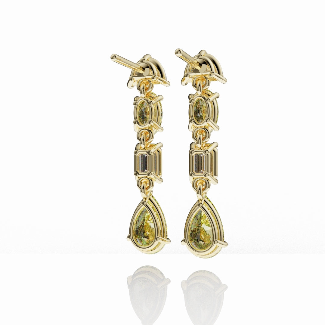 Handcrafted high jewellery yellow diamond earrings with pear, oval and emerald cut diamonds.