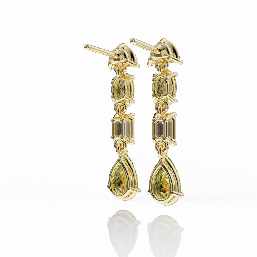 Statement drop earrings featuring fancy yellow diamonds and brilliant white diamonds in a bespoke gold setting.