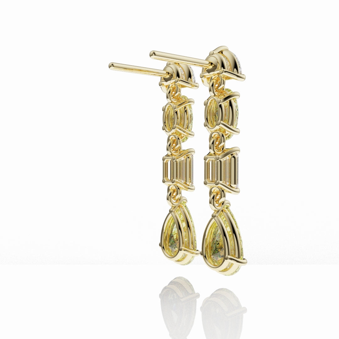 Luxury designer earrings with natural yellow diamonds and white diamonds in an elongated drop silhouette.
