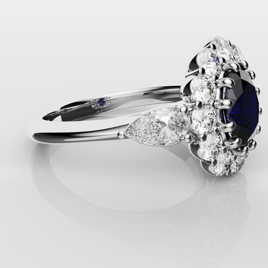 Oval Sapphire Cluster With Pear Shoulder Diamonds
