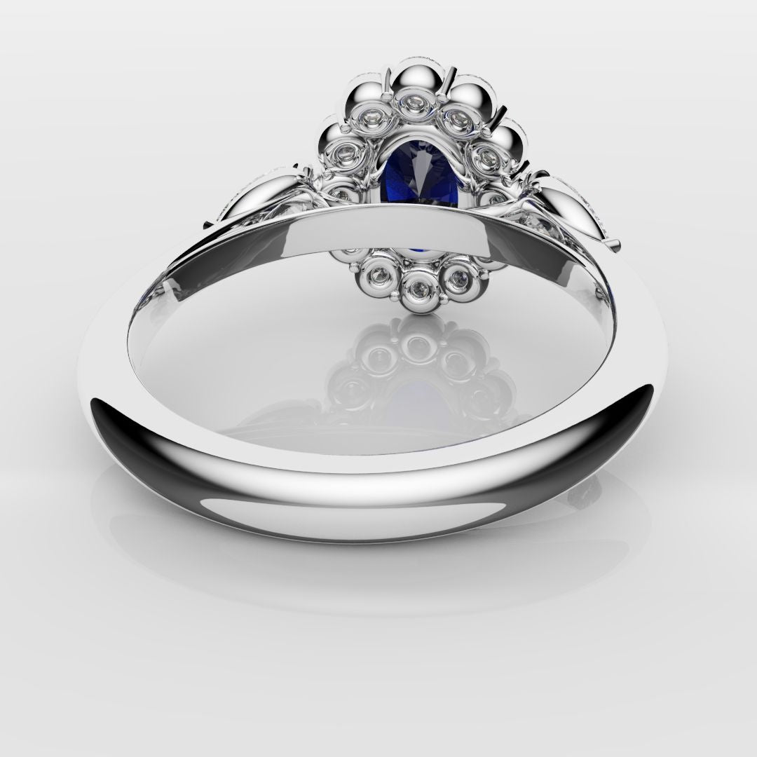 Oval Sapphire Cluster With Pear Shoulder Diamonds