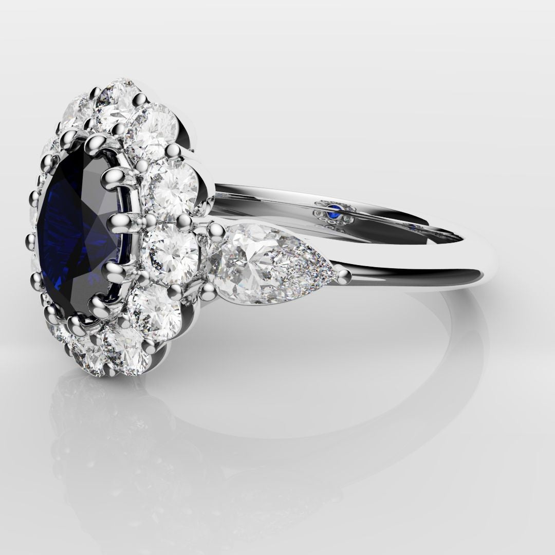 Oval Sapphire Cluster With Pear Shoulder Diamonds
