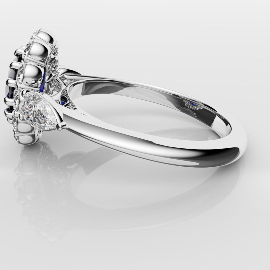 Oval Sapphire Cluster With Pear Shoulder Diamonds