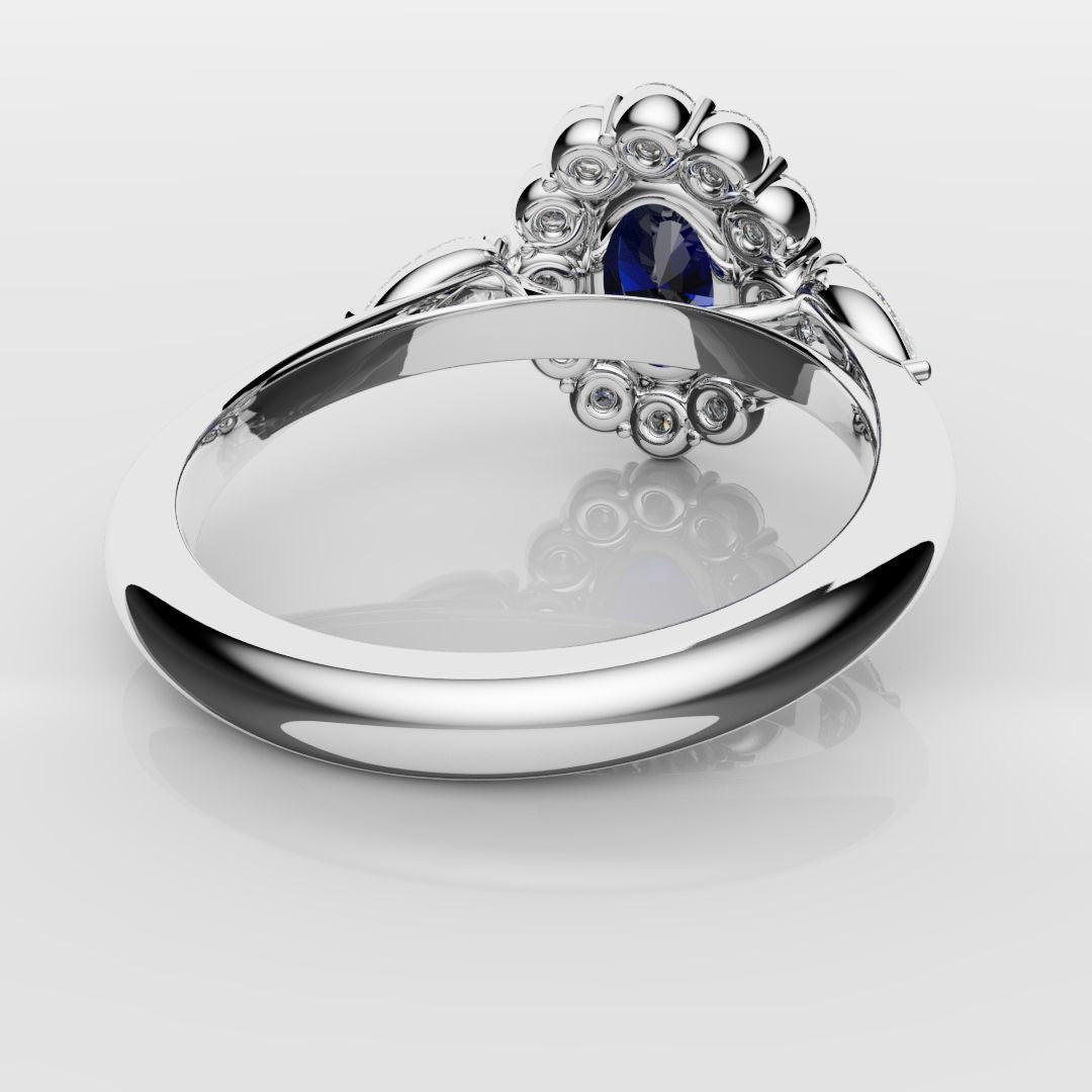 Oval Sapphire Cluster With Pear Shoulder Diamonds