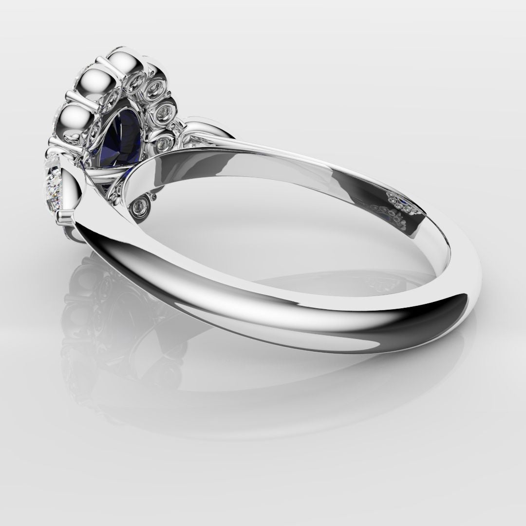 Oval Sapphire Cluster With Pear Shoulder Diamonds
