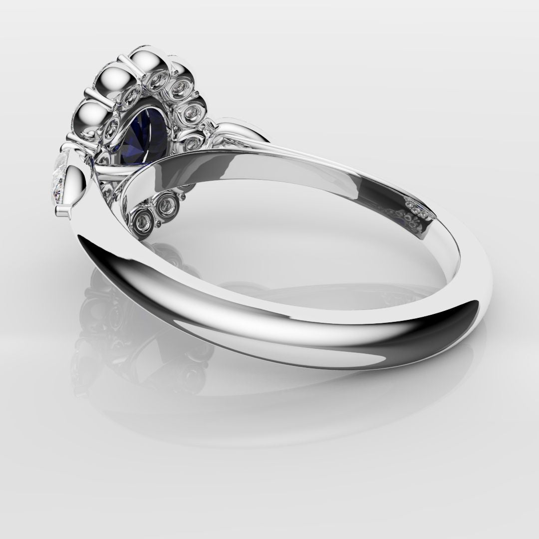 Oval Sapphire Cluster With Pear Shoulder Diamonds
