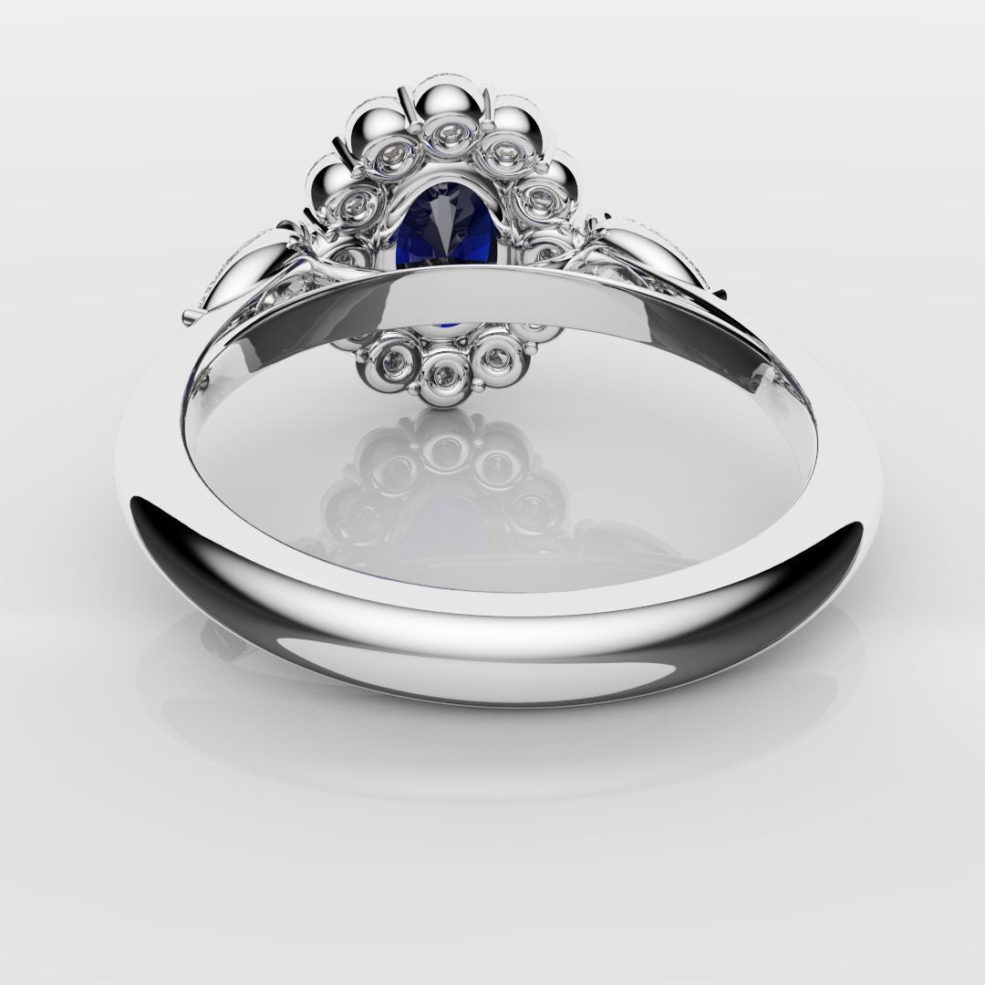 Oval Sapphire Cluster With Pear Shoulder Diamonds