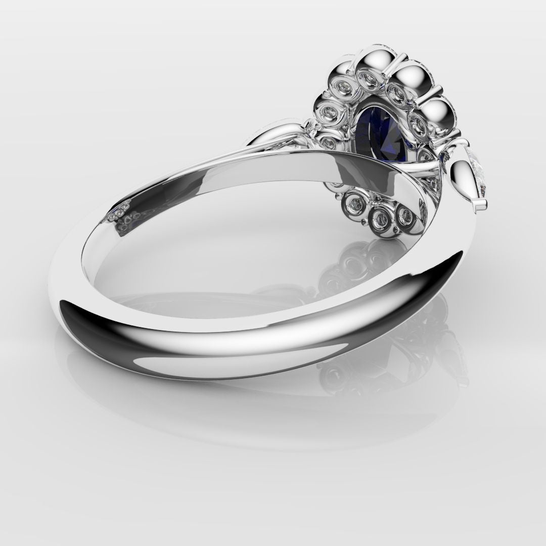 Oval Sapphire Cluster With Pear Shoulder Diamonds
