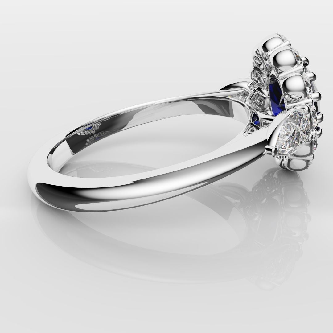 Oval Sapphire Cluster With Pear Shoulder Diamonds