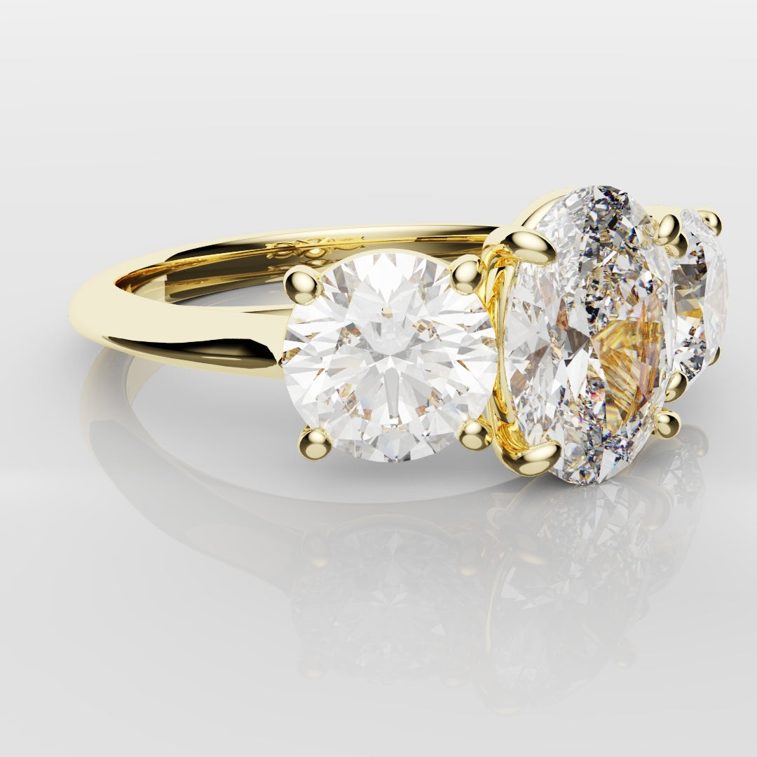 Oval Trilogy With Round Brilliant Cut Shoulder Diamonds