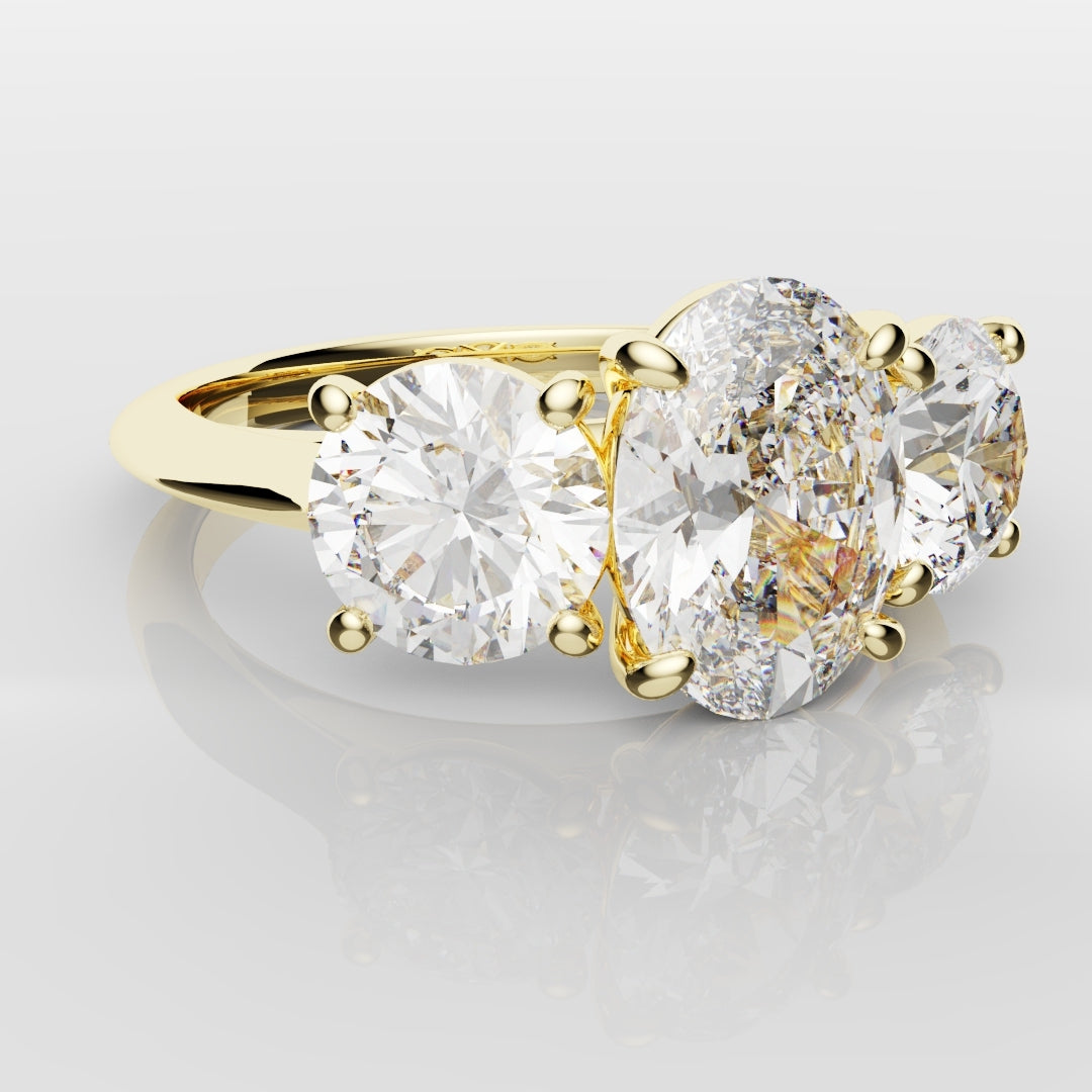 Oval Trilogy With Round Brilliant Cut Shoulder Diamonds