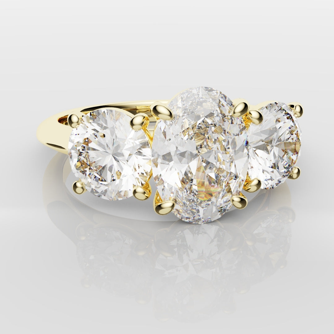 Oval Trilogy With Round Brilliant Cut Shoulder Diamonds