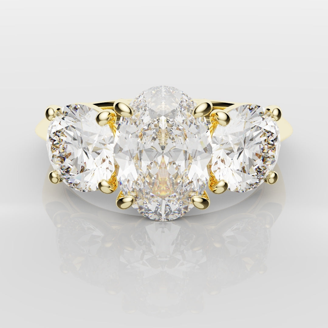 Oval Trilogy With Round Brilliant Cut Shoulder Diamonds