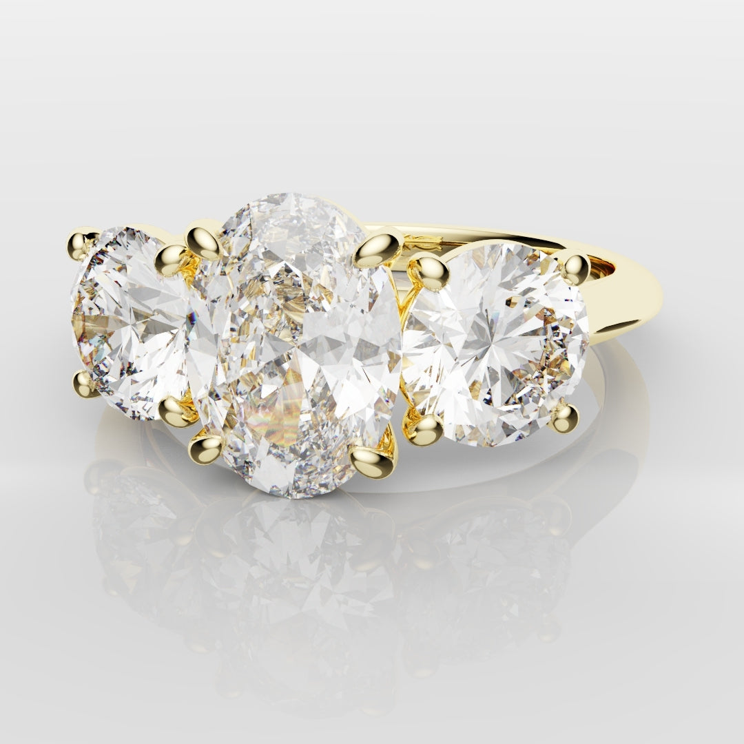 Oval Trilogy With Round Brilliant Cut Shoulder Diamonds