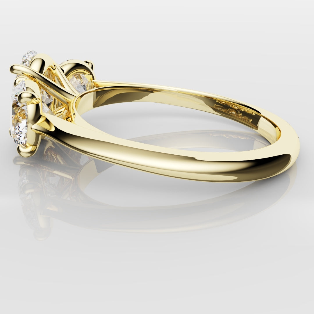 Oval Trilogy With Round Brilliant Cut Shoulder Diamonds
