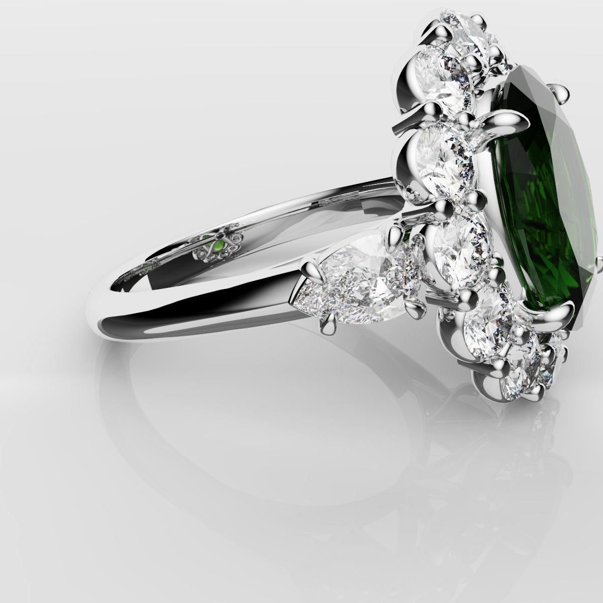 Oval Emerald Cluster Engagement Ring With Pear Shoulder Diamonds
