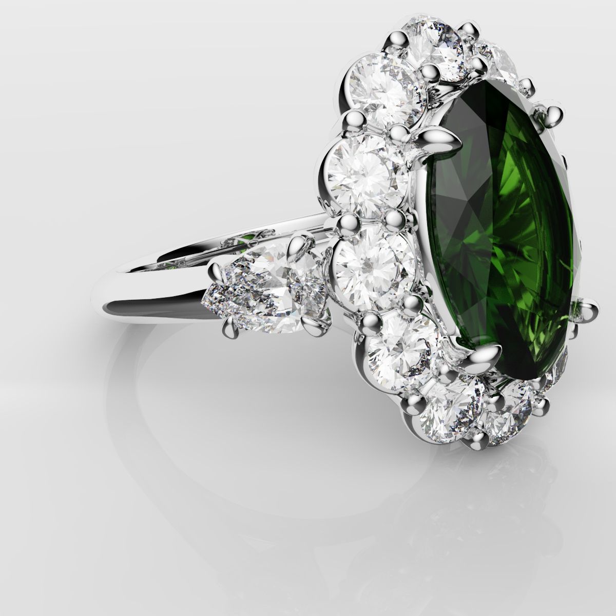 Oval Emerald Cluster Engagement Ring With Pear Shoulder Diamonds