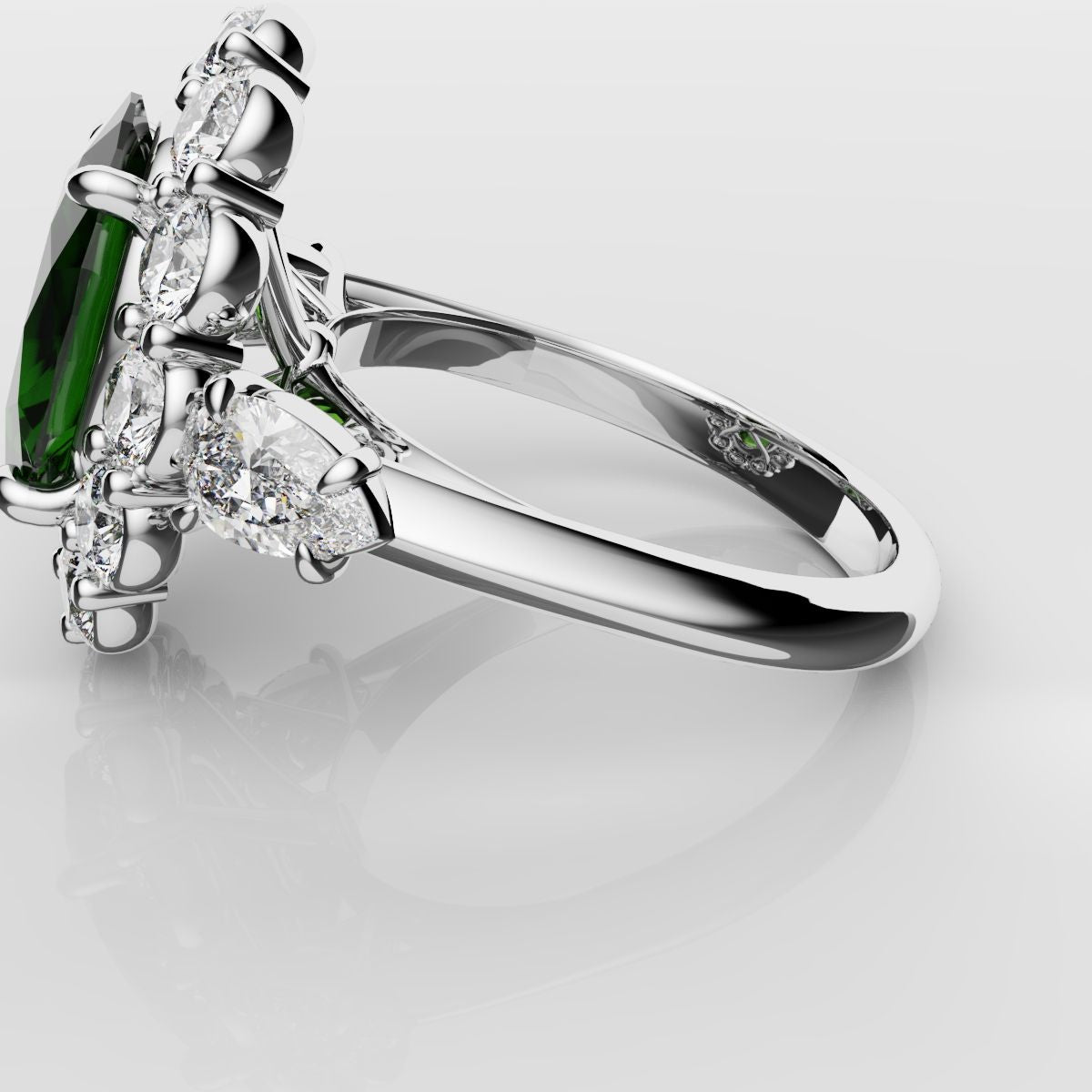 Oval Emerald Cluster Engagement Ring With Pear Shoulder Diamonds