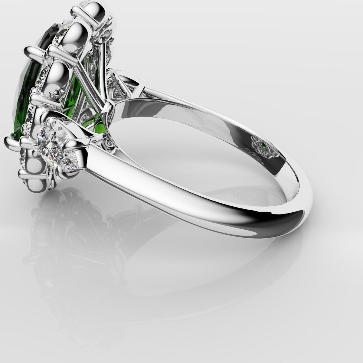 Oval Emerald Cluster Engagement Ring With Pear Shoulder Diamonds