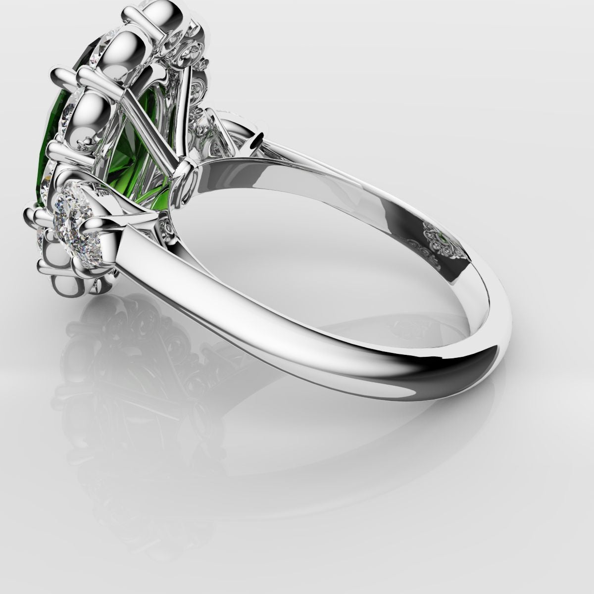 Oval Emerald Cluster Engagement Ring With Pear Shoulder Diamonds