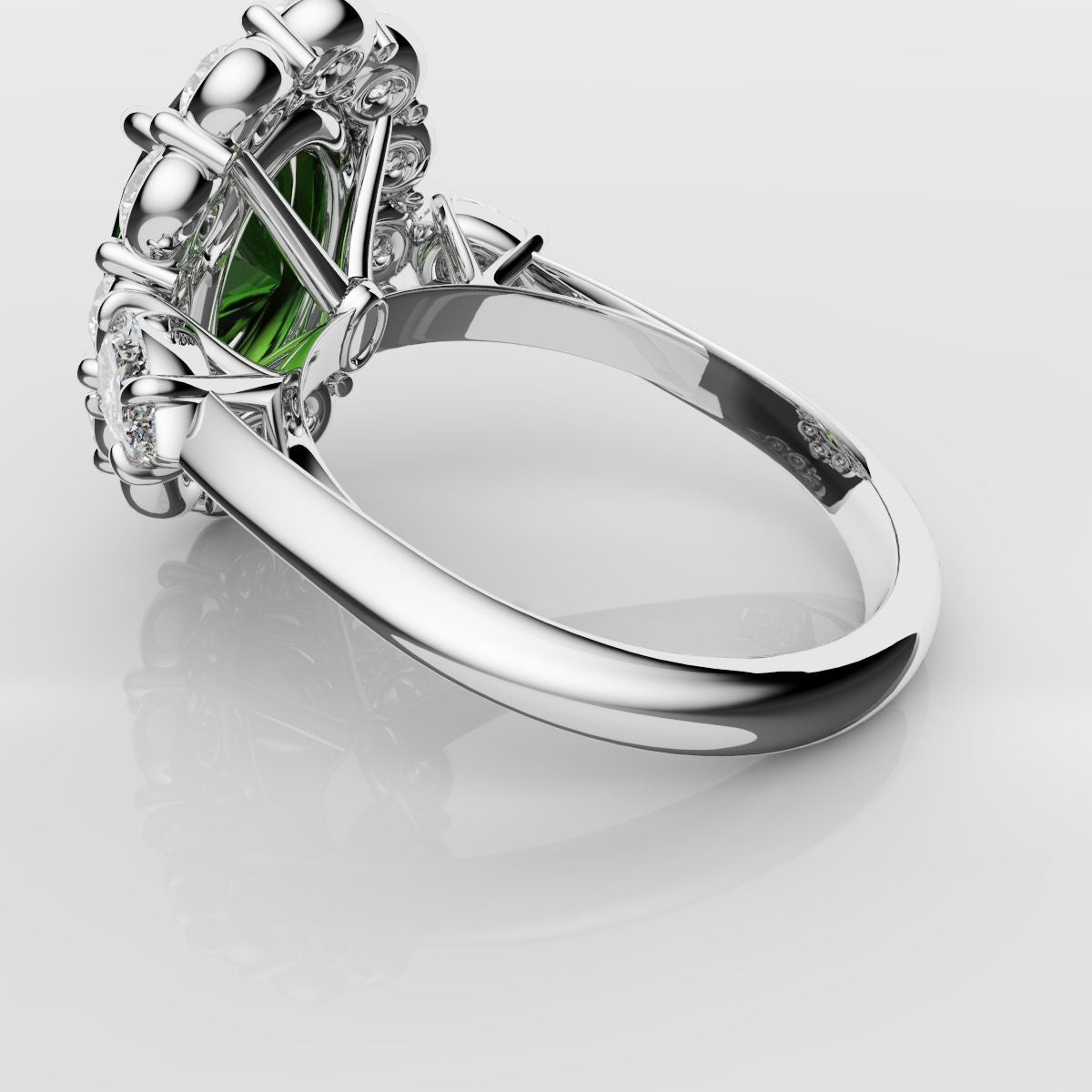 Oval Emerald Cluster Engagement Ring With Pear Shoulder Diamonds