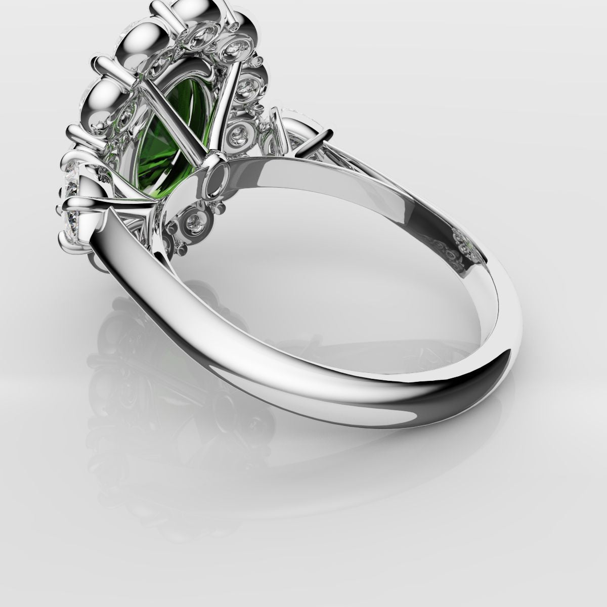 Oval Emerald Cluster Engagement Ring With Pear Shoulder Diamonds