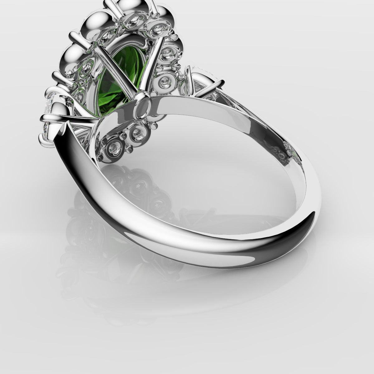 Oval Emerald Cluster Engagement Ring With Pear Shoulder Diamonds