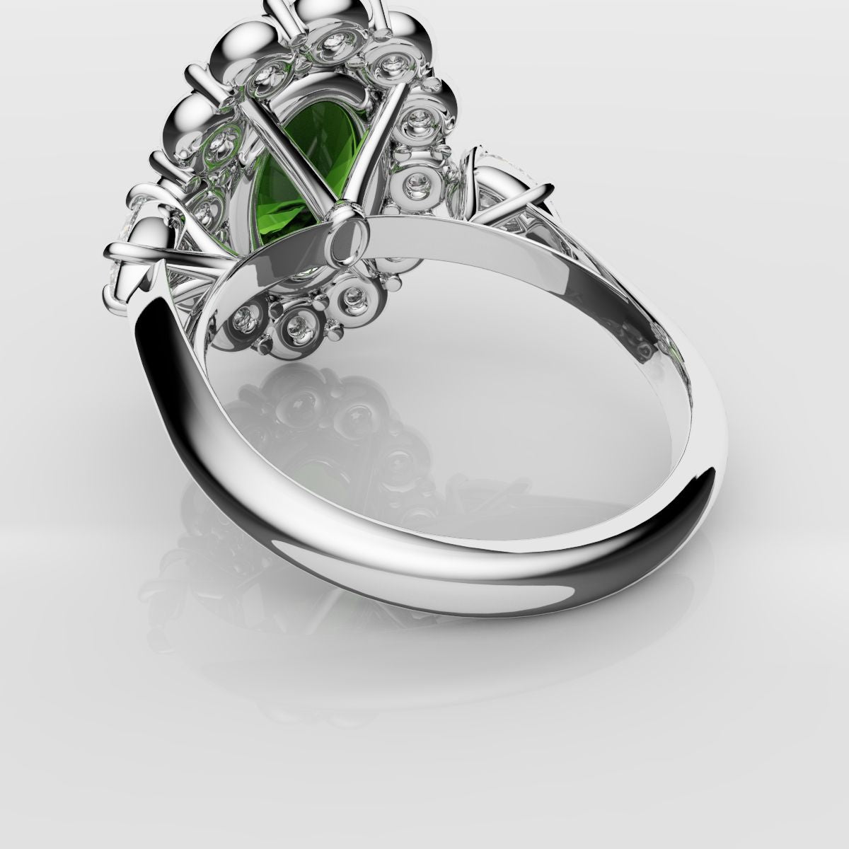 Oval Emerald Cluster Engagement Ring With Pear Shoulder Diamonds