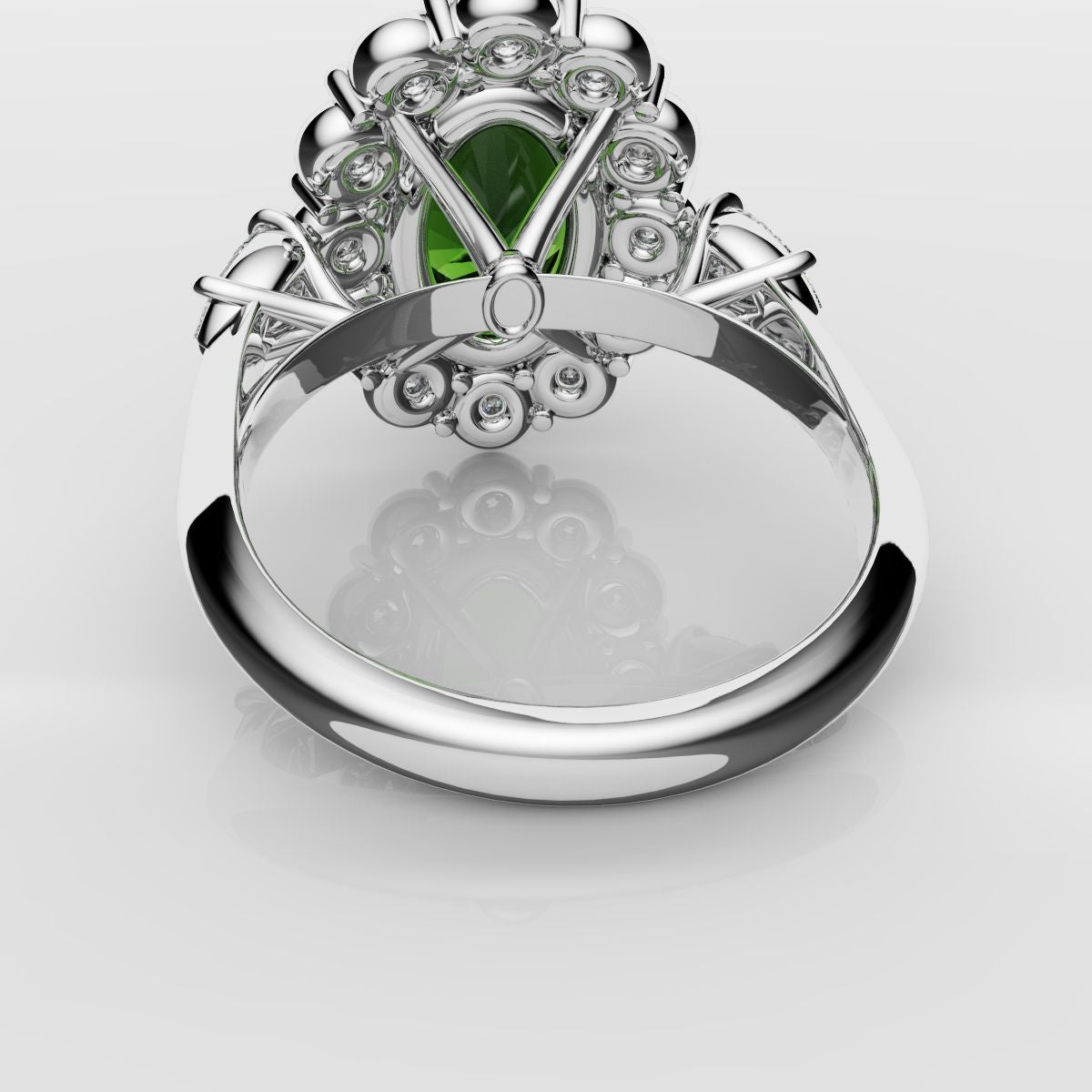Oval Emerald Cluster Engagement Ring With Pear Shoulder Diamonds