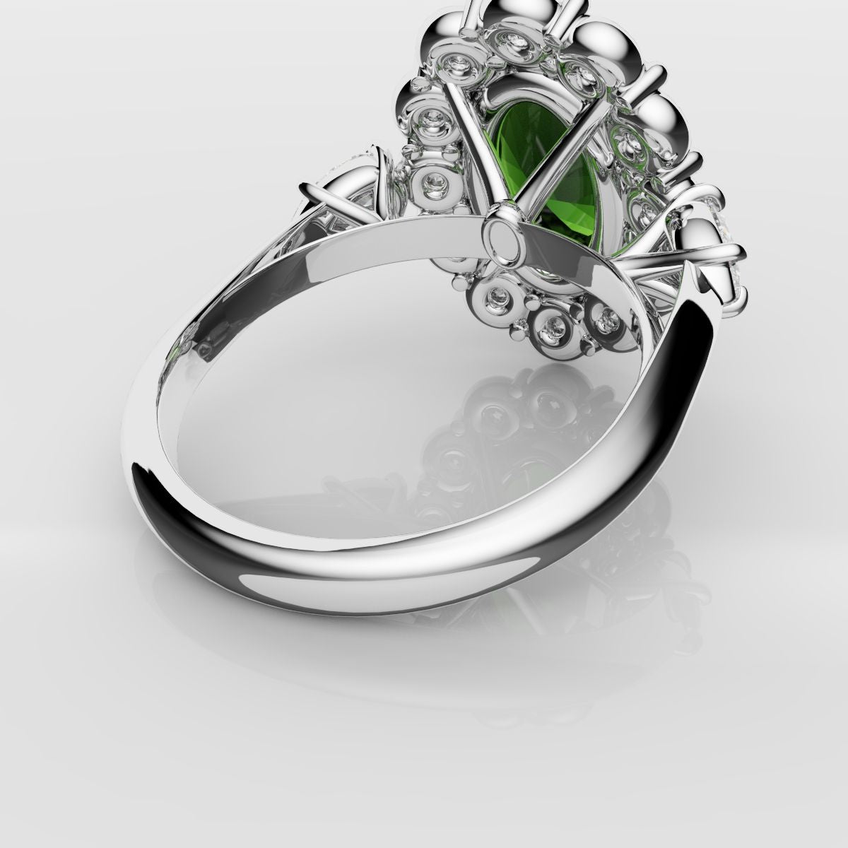 Oval Emerald Cluster Engagement Ring With Pear Shoulder Diamonds