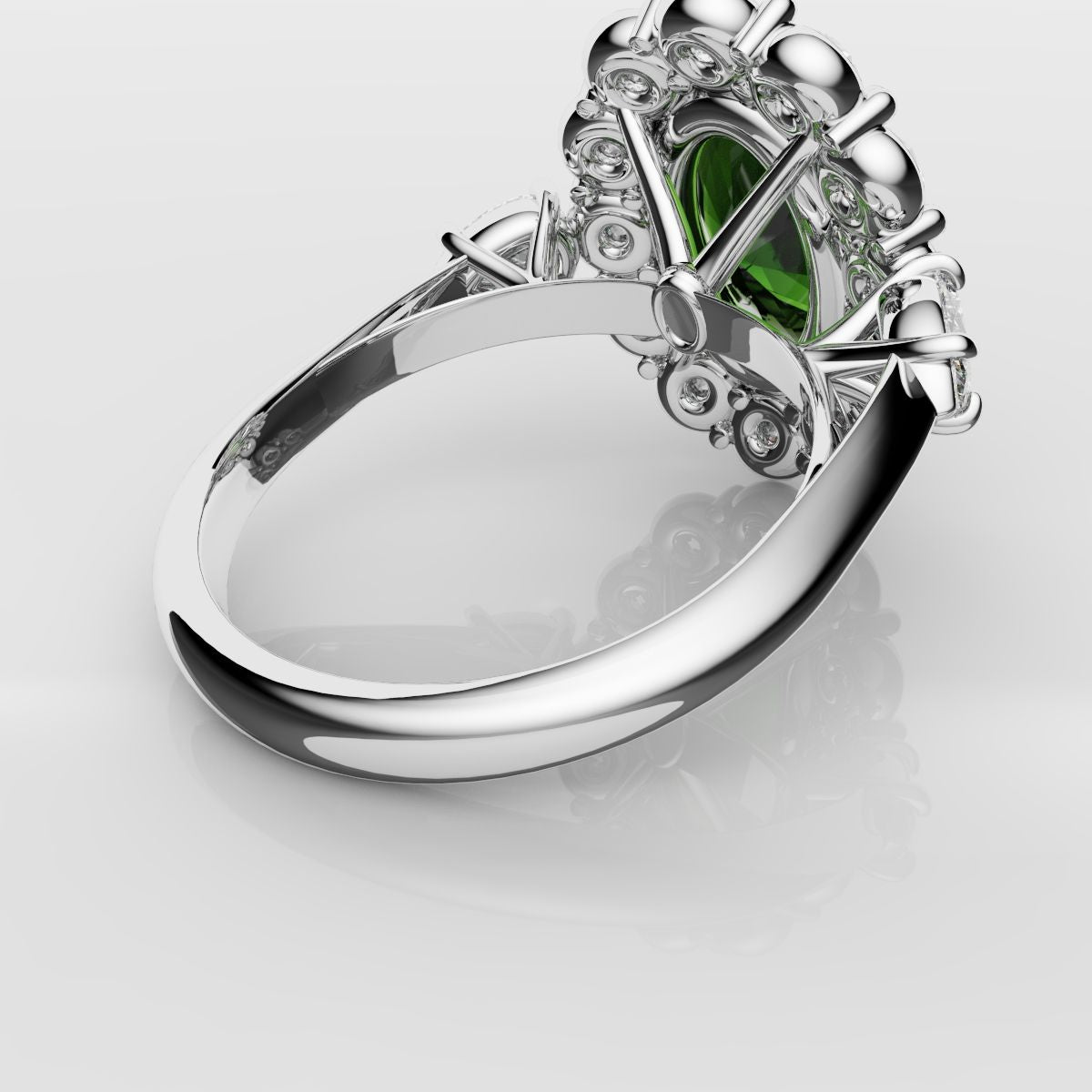 Oval Emerald Cluster Engagement Ring With Pear Shoulder Diamonds