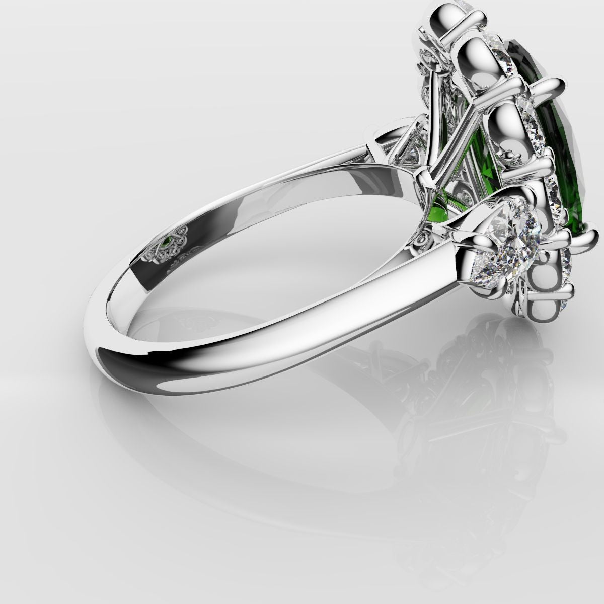 Oval Emerald Cluster Engagement Ring With Pear Shoulder Diamonds