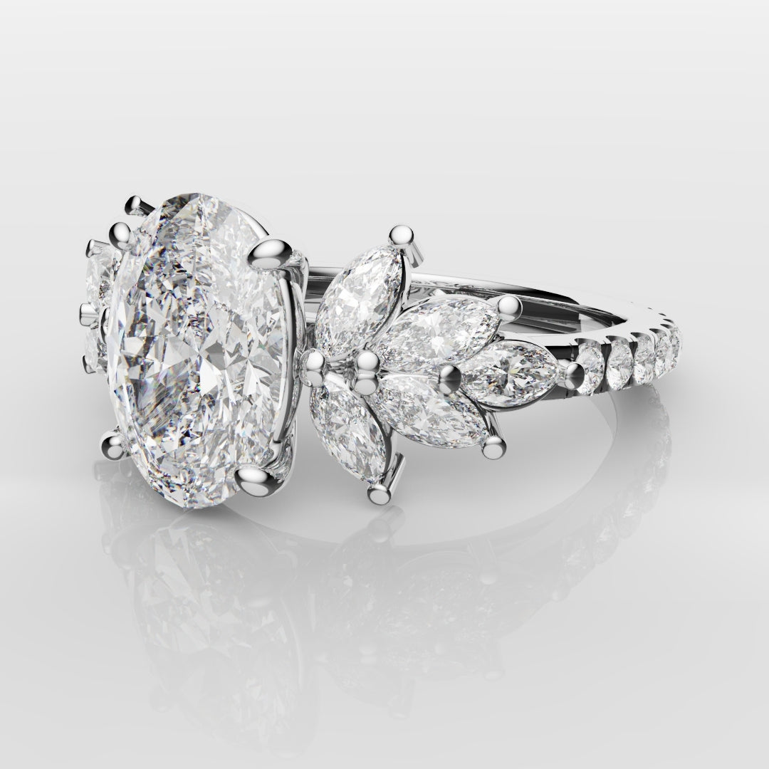 Oval Diamond Engagement Ring With Marquise Detailing